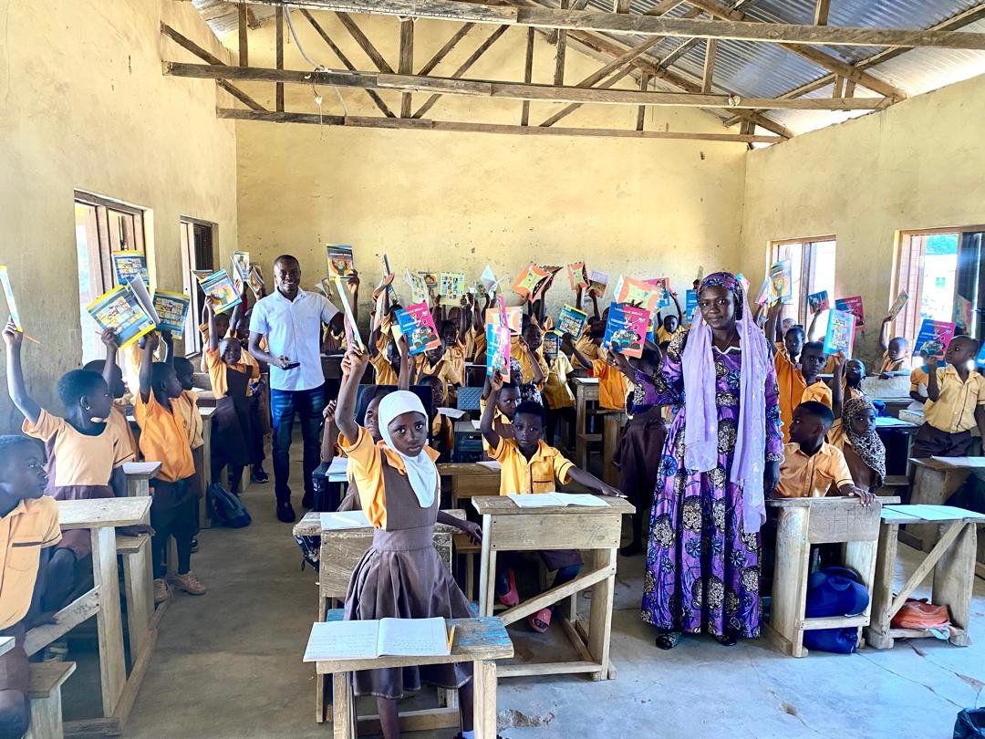 Children Excited After Receiving Books from our Team